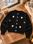 Close-up detail of black crochet flower women's cardigan by Purple Imli