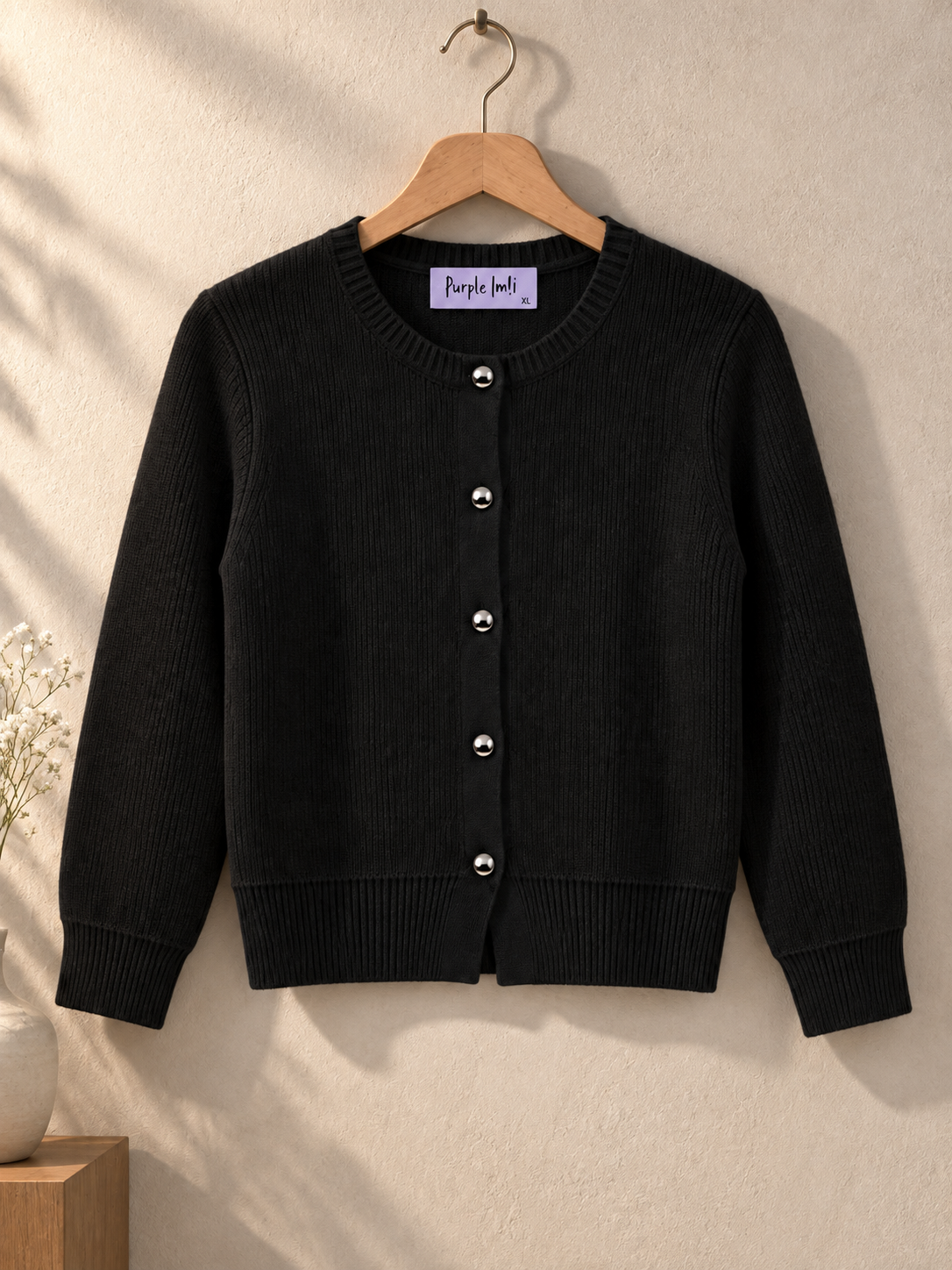 Close-up detail of black classic button women's cardigan by Purple Imli