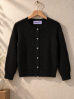 Close-up detail of black classic button women's cardigan by Purple Imli