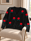 Close-up detail of black 3D flower V-neck women's cardigan by Purple Imli