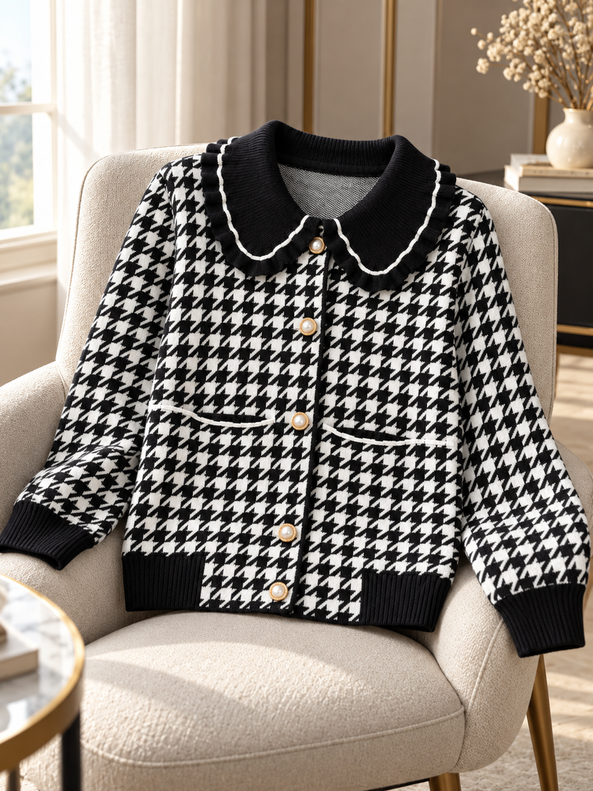 Close-up detail of black houndtooth ruffle collar women's cardigan by Purple Imli