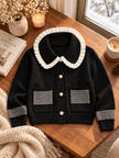 Close-up detail of black striped pocket ruffle women's cardigan by Purple Imli