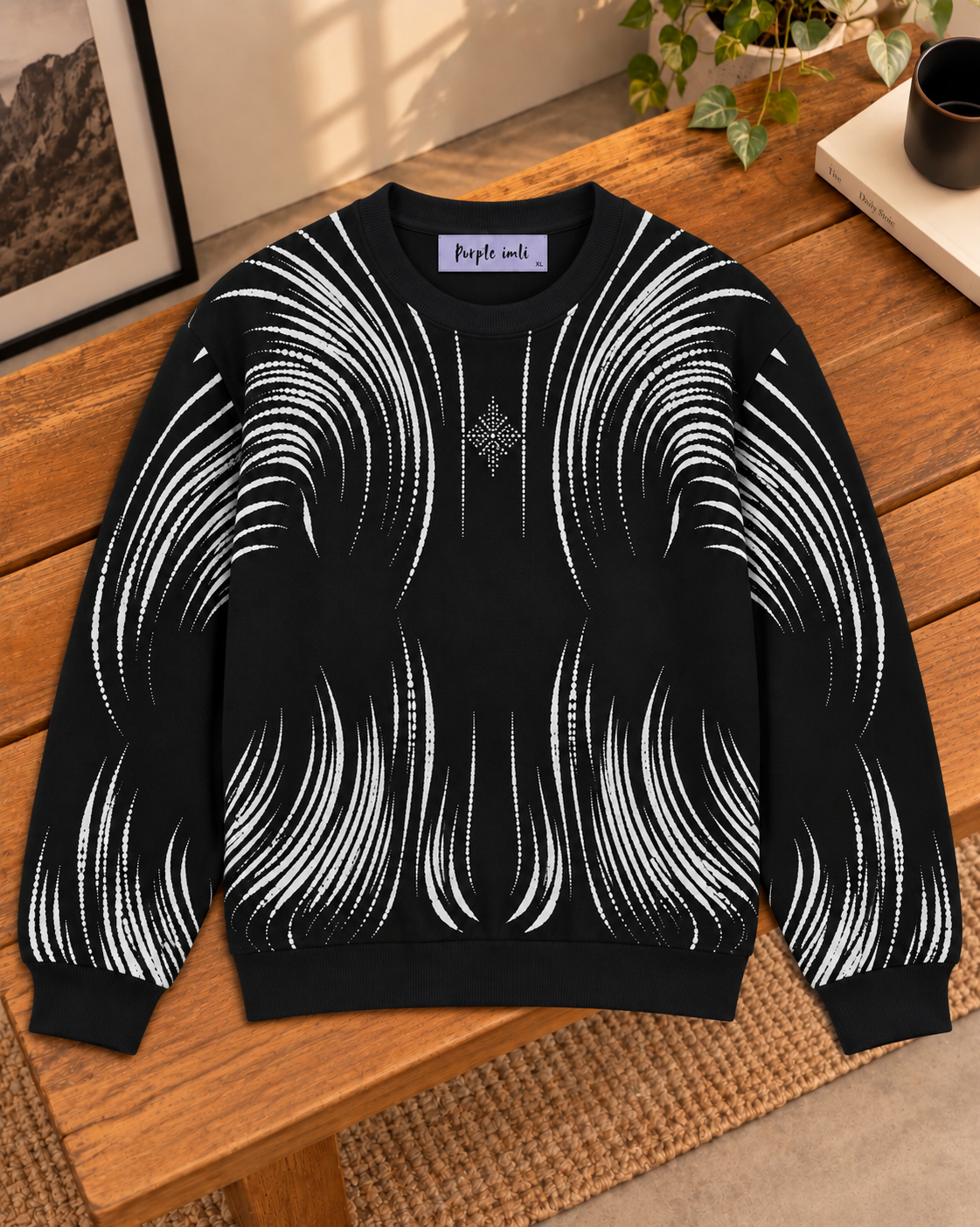 Close-up detail of black brushstroke rhinestone women's sweater by Purple Imli