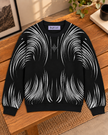 Close-up detail of black brushstroke rhinestone women's sweater by Purple Imli