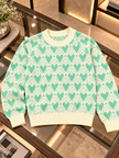 Close-up detail of green heart jacquard women's sweater by Purple Imli