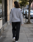 Grey embroidered round-neck women's sweater by Purple Imli – back view