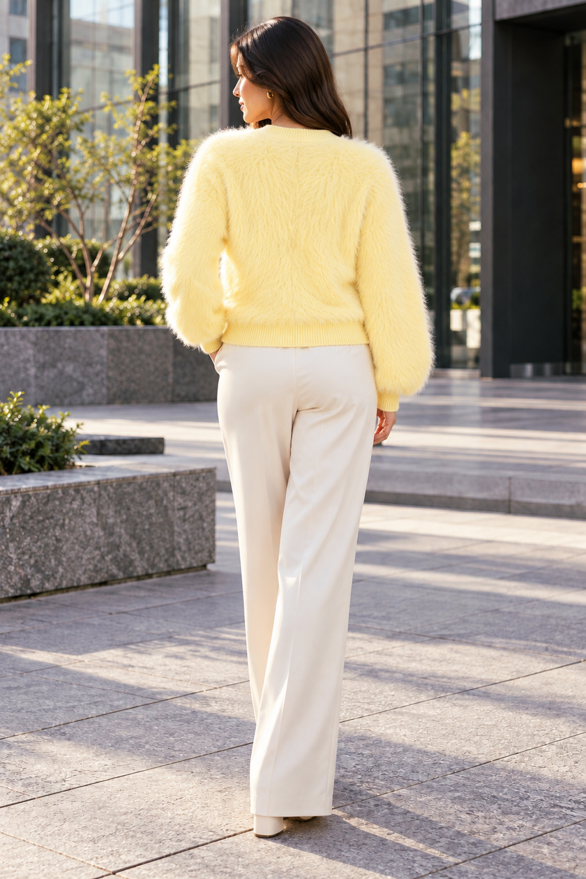 Light yellow fuzzy daisy button women's cardigan by Purple Imli – back view