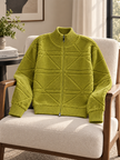 Close-up detail of olive green textured knit zip-up women's sweater by Purple Imli