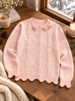 Close-up detail of pink scalloped bow women's cardigan by Purple Imli