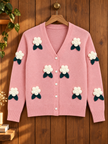 Close-up detail of pink 3D flower V-neck women's cardigan by Purple Imli