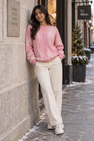 Pink brushstroke rhinestone women's sweater by Purple Imli – front view