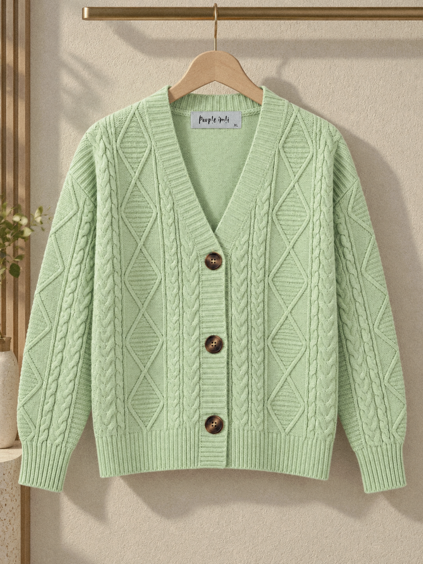 Close-up detail of pista green cable knit V-neck women's cardigan by Purple Imli