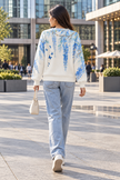 White & Blue wisteria butterfly women's sweater by Purple Imli – back view