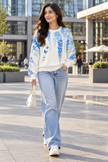White & Blue wisteria butterfly women's sweater by Purple Imli – front view