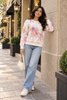 White & Pink floral horse print women's sweater by Purple Imli – front view